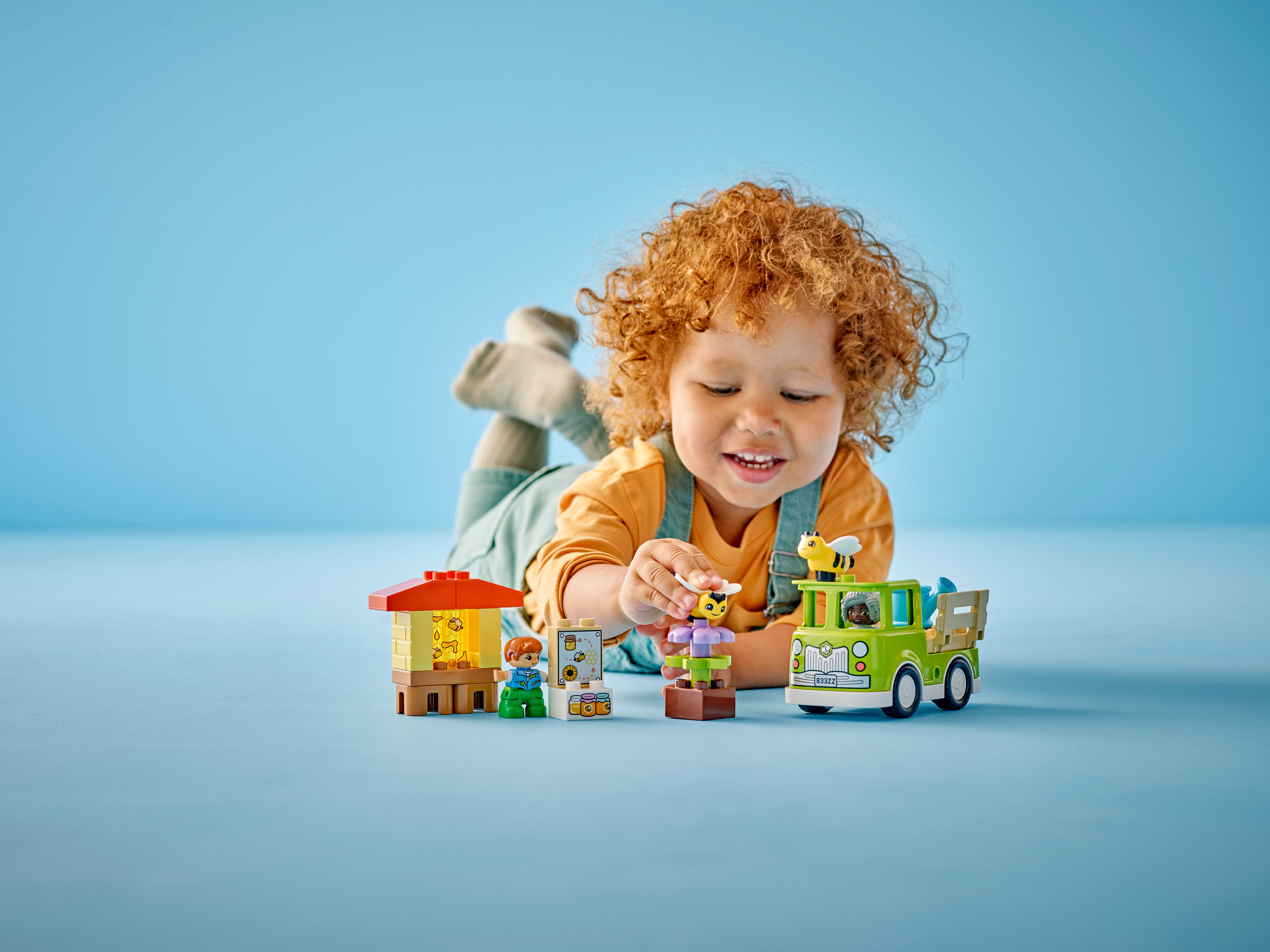 Happy children playing with toys